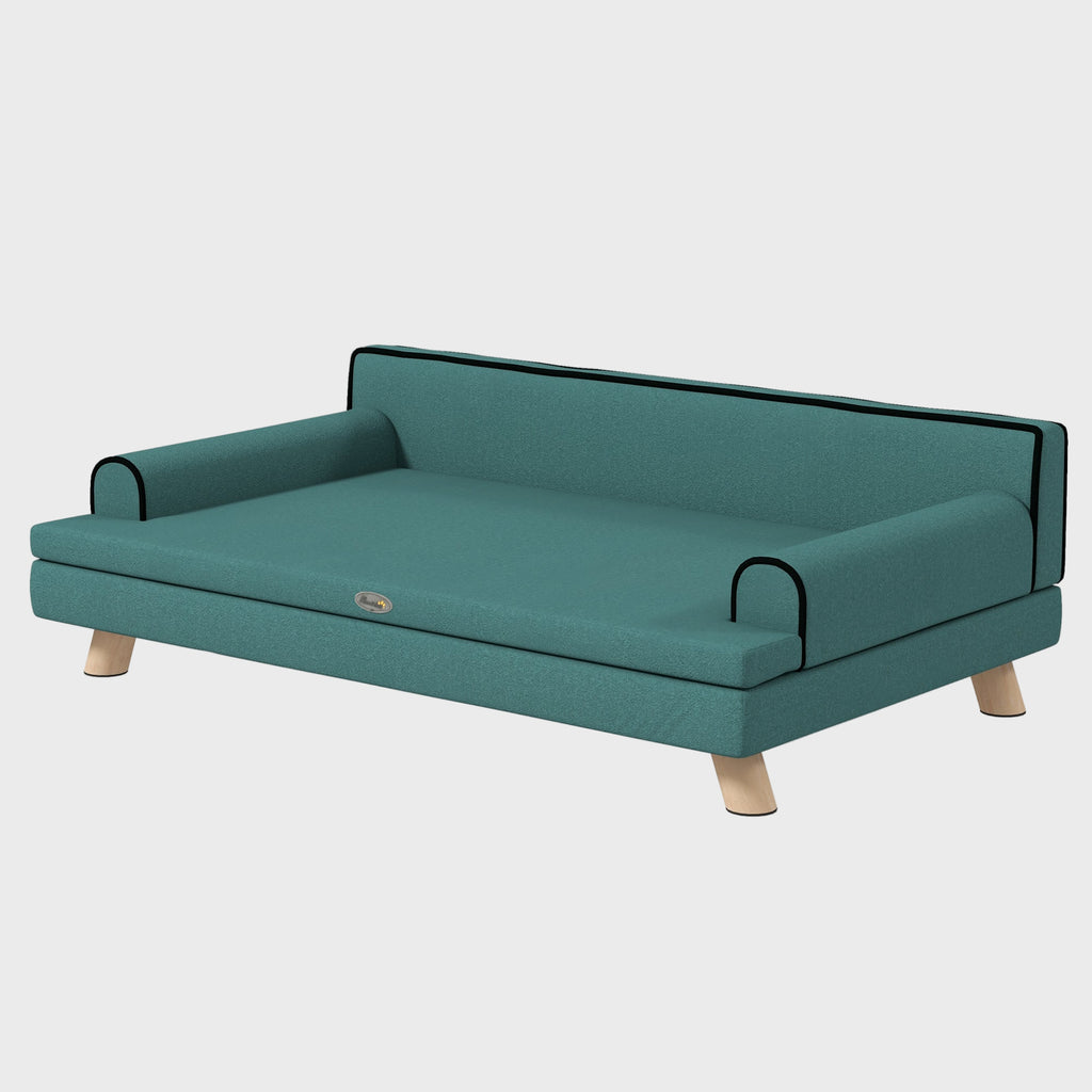Teal pet bed with wooden legs on a white background