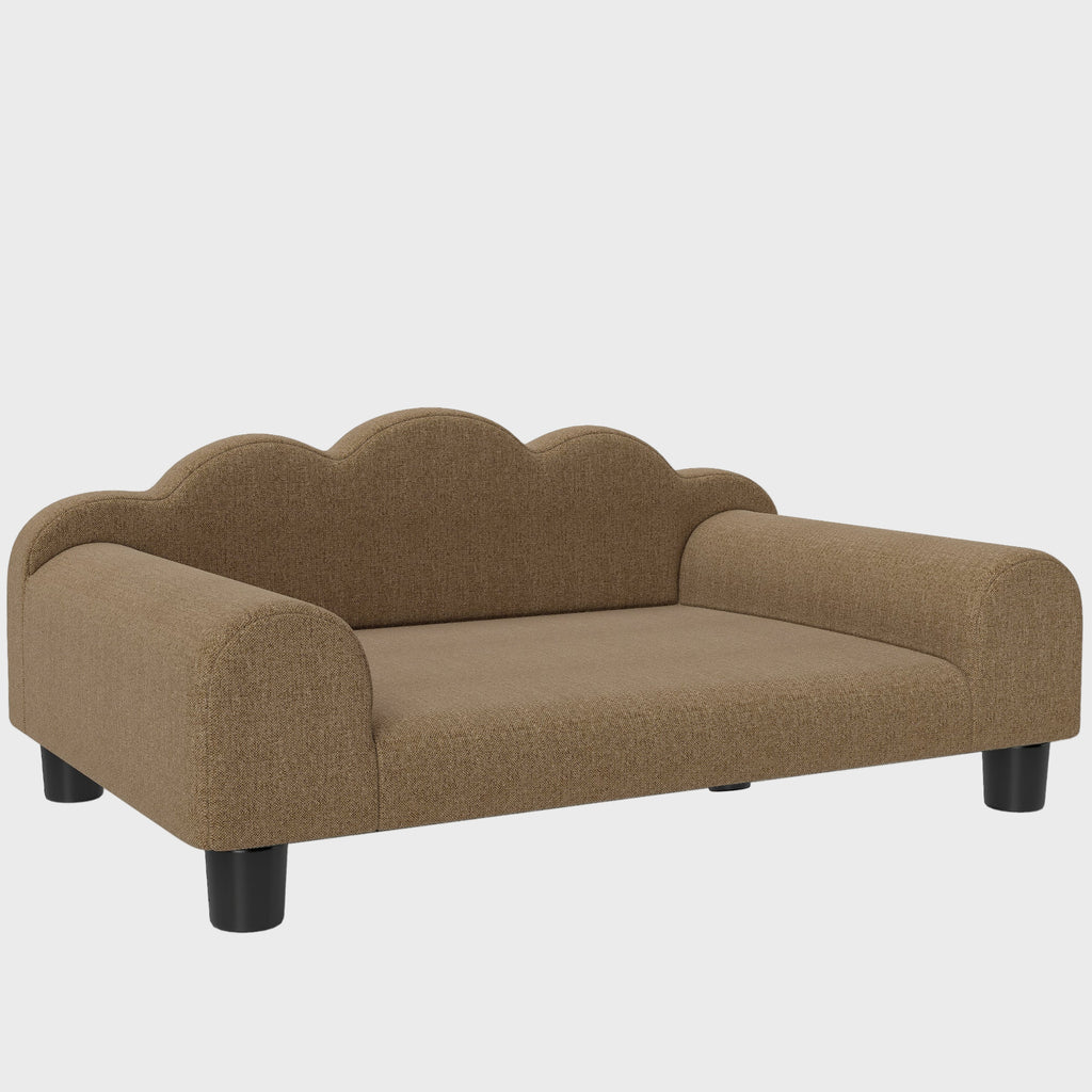 Brown pet bed with scalloped edges on a white background