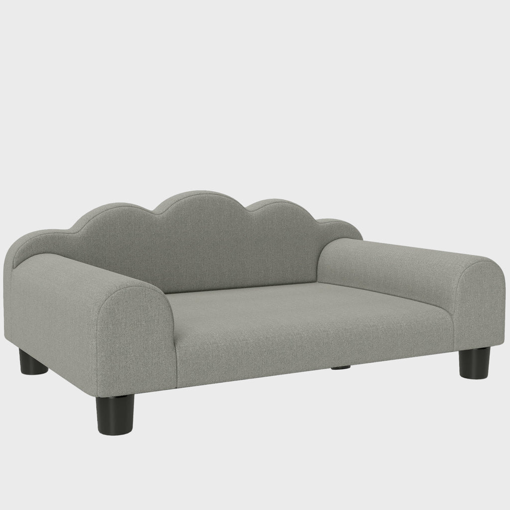 Gray pet bed with scalloped edge on a white background