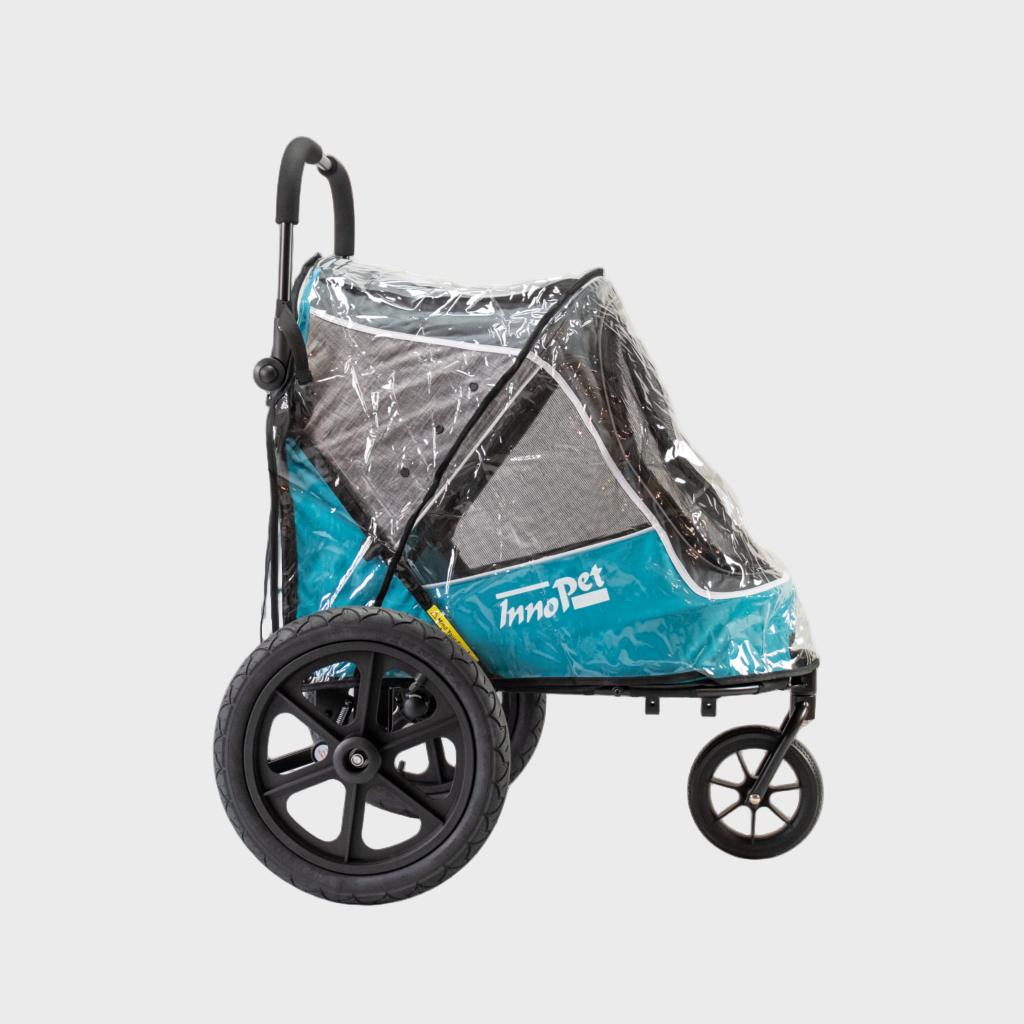 Pet stroller with a clear rain cover on a white background
