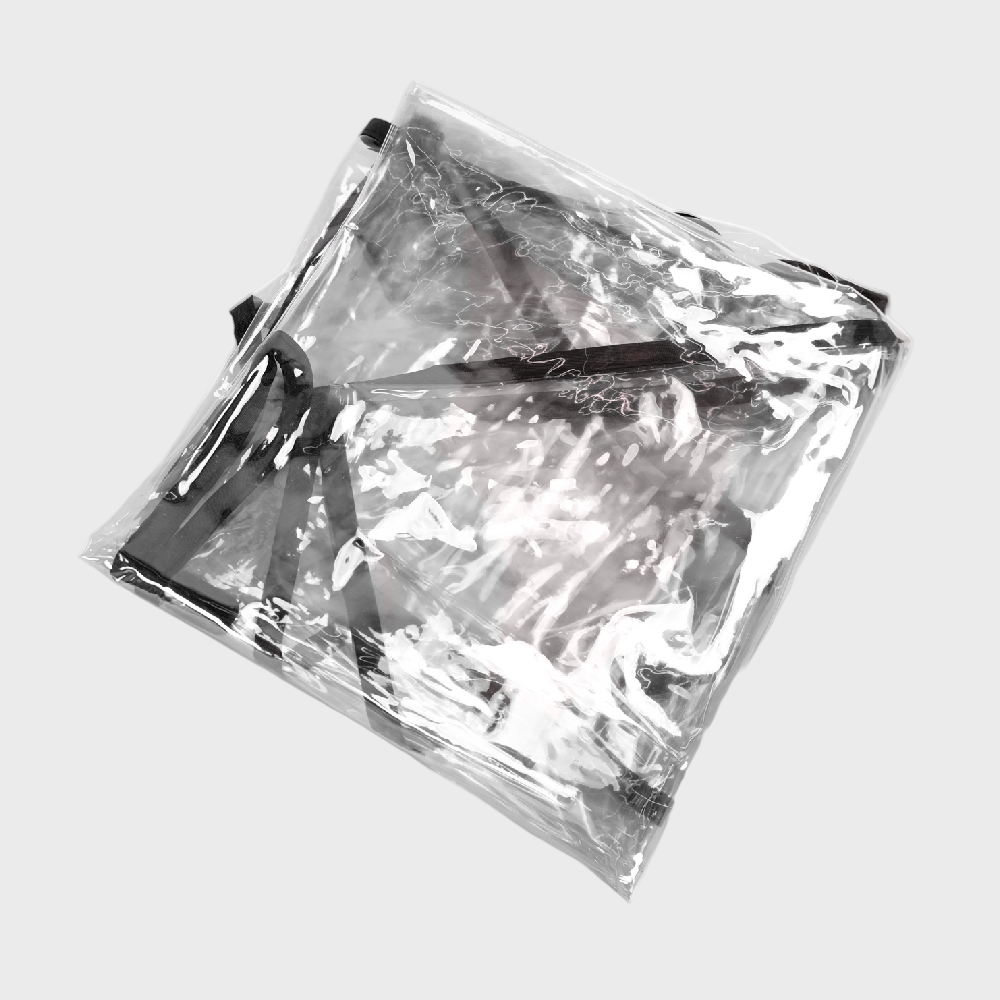 Clear plastic bag with a black handle on a white background